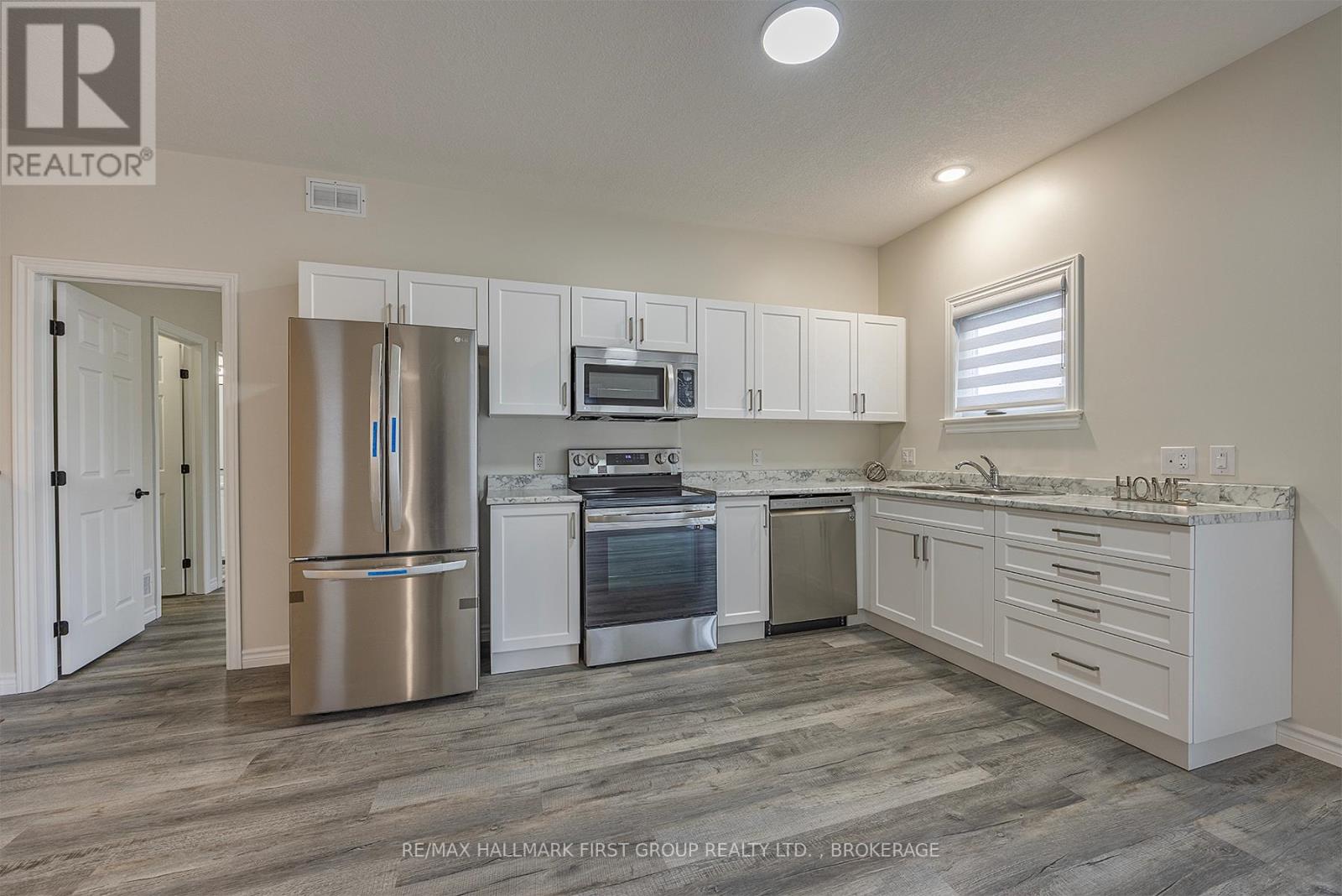 201 Creighton Drive, Loyalist, Ontario  K0H 2H0 - Photo 5 - X12657210