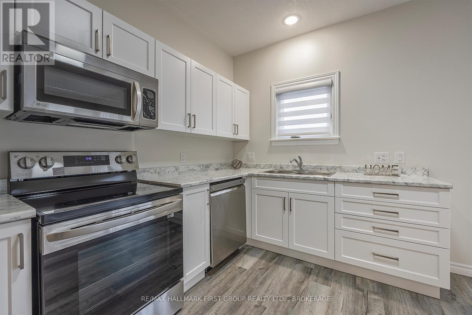 201 Creighton Drive, Loyalist, Ontario  K0H 2H0 - Photo 6 - X12657210