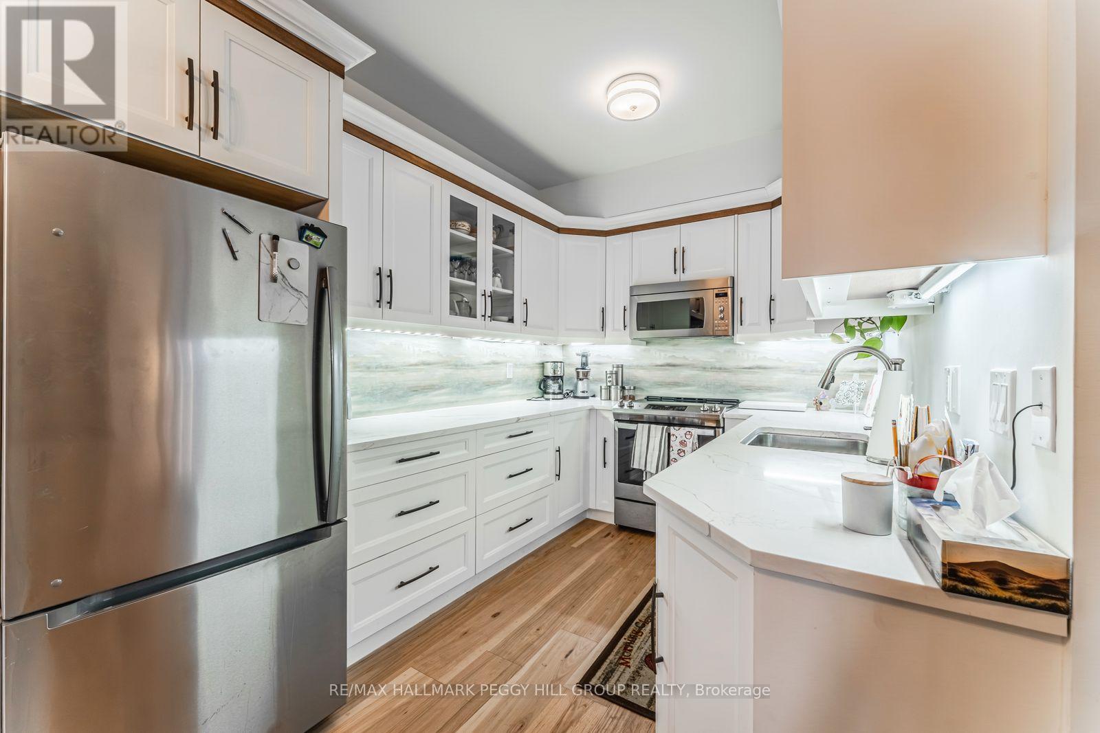 104 - 200 Collier Street, Barrie, Ontario  L4M 1H7 - Photo 5 - S12671456