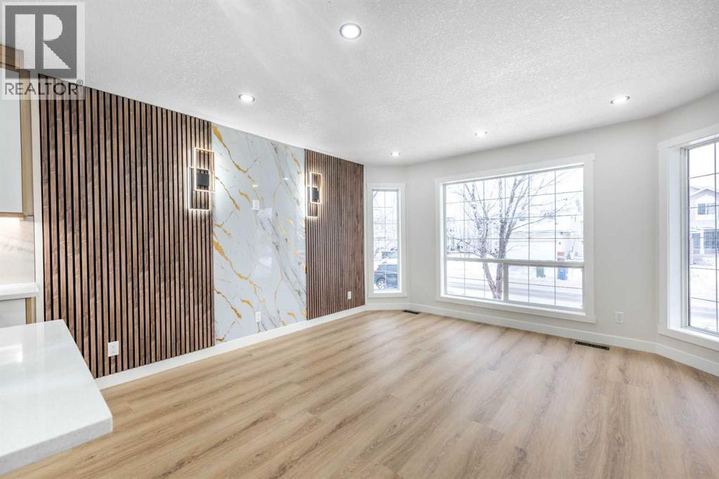 7277 Laguna Way Ne, Calgary, Alberta  T1Y 7C9 - Photo 7 - A2277590