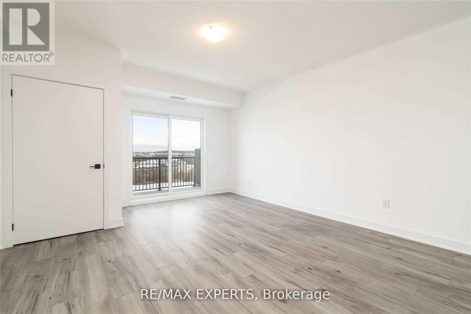 604 - 4 Spice Way, Barrie, Ontario  L9J 0M2 - Photo 5 - S12672076