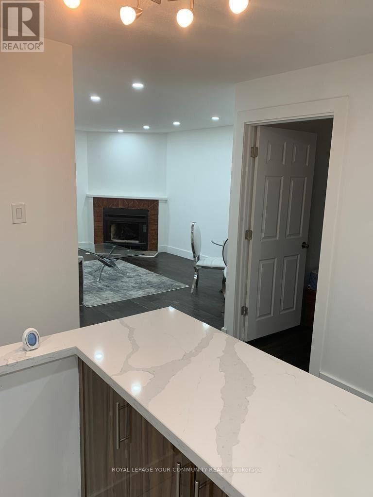 1011 - 1450 Glen Abbey Gate, Oakville, Ontario  L6M 2V7 - Photo 4 - W12473650