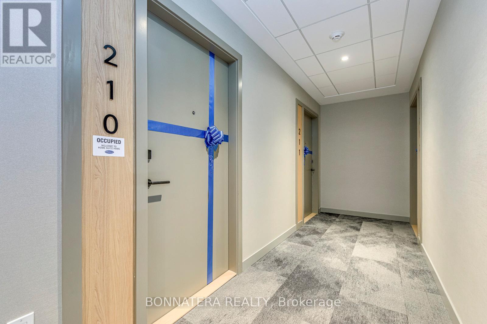 210 - 720 Whitlock Avenue, Milton, Ontario  L9E 2B5 - Photo 4 - W12672584