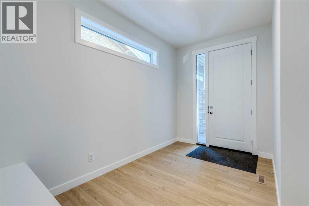 613 Sailfin Drive, Rural Rocky View County, Alberta  T3Z 2G7 - Photo 3 - A2275438