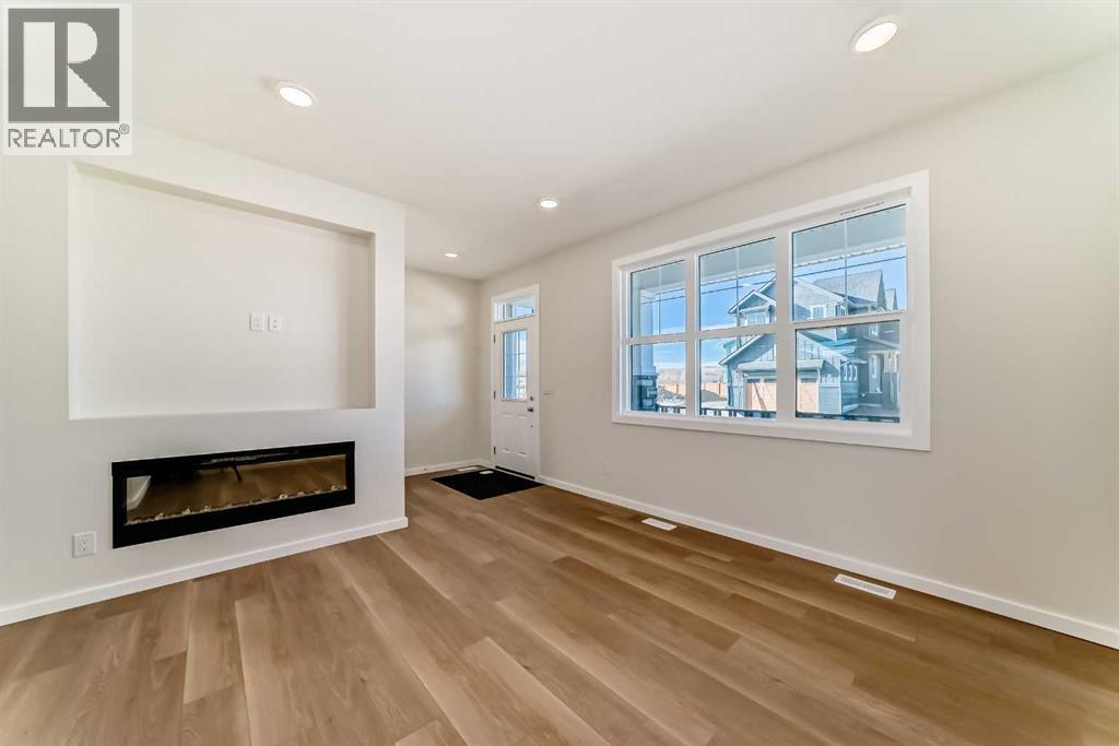 32 Creekside Rise Sw, Calgary, Alberta  T2X 5V9 - Photo 6 - A2272383