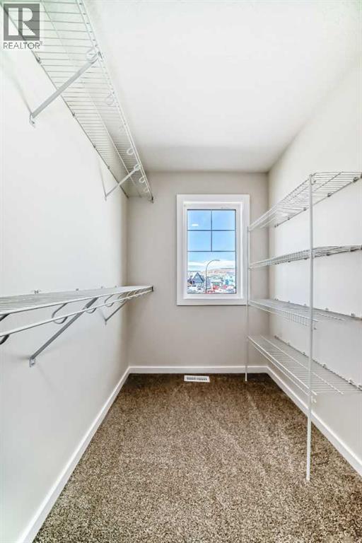 32 Creekside Rise Sw, Calgary, Alberta  T2X 5V9 - Photo 25 - A2272383