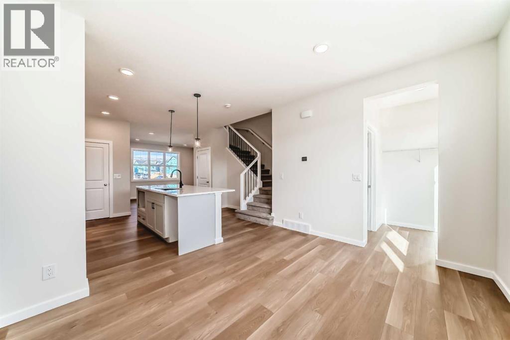 32 Creekside Rise Sw, Calgary, Alberta  T2X 5V9 - Photo 18 - A2272383