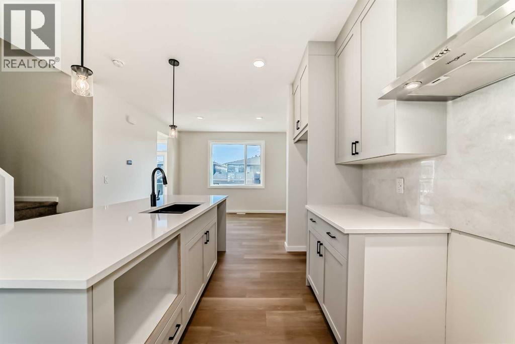 32 Creekside Rise Sw, Calgary, Alberta  T2X 5V9 - Photo 12 - A2272383