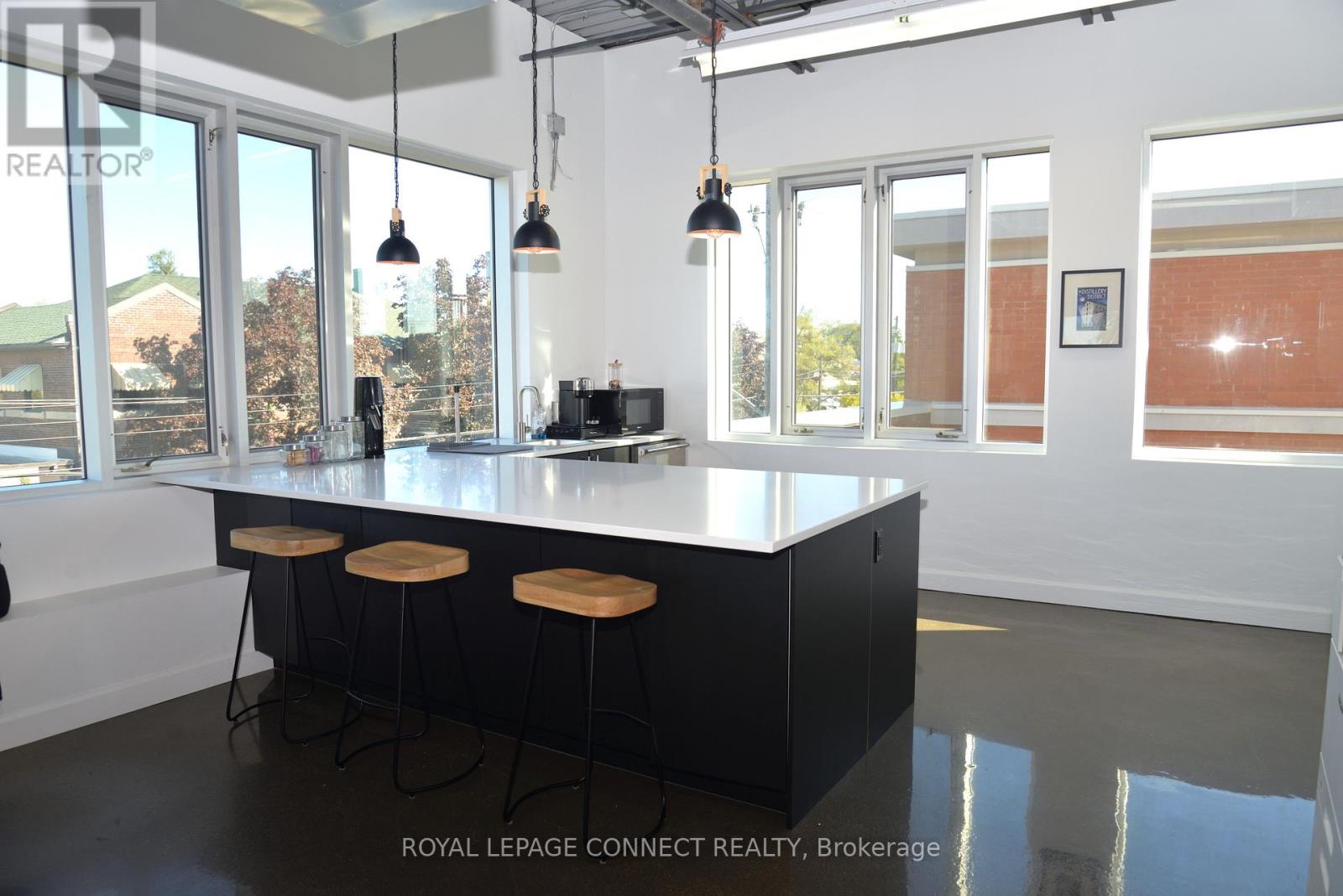 208 - 41 Industrial Street, Toronto, Ontario  M4G 2H5 - Photo 3 - C12673026