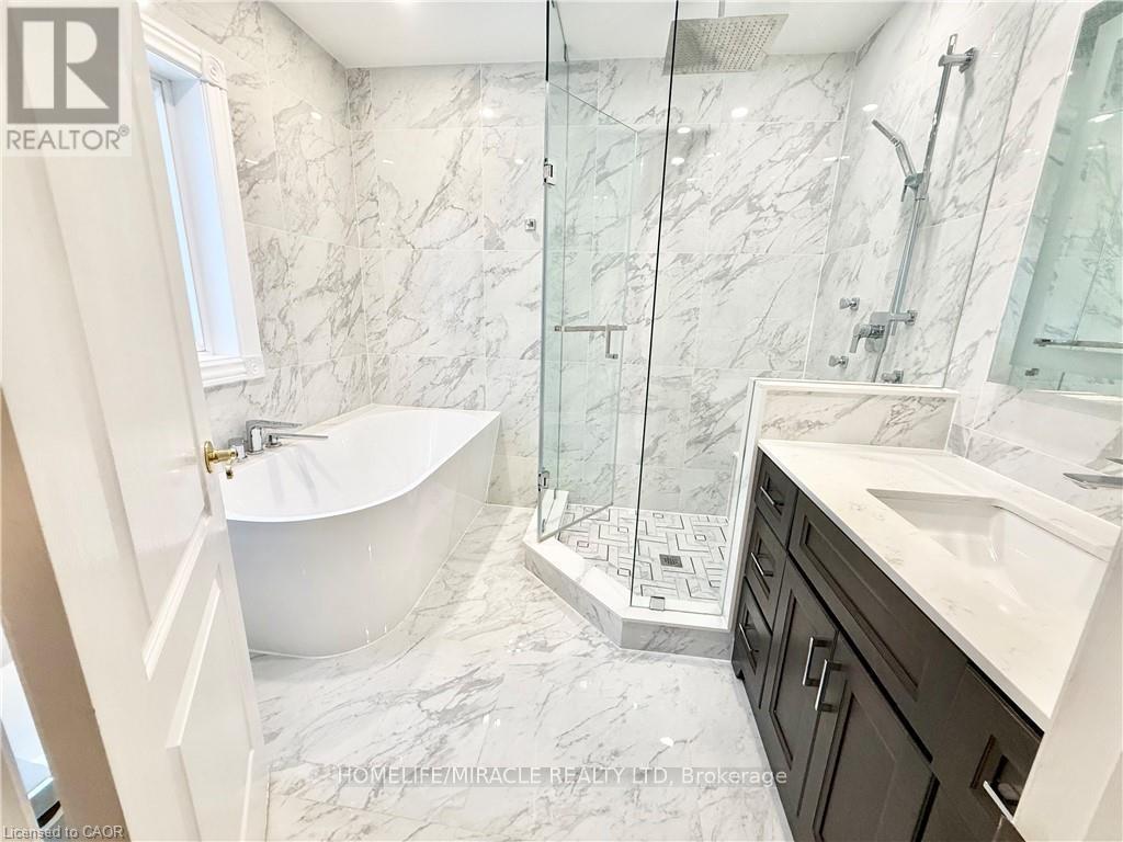 243 Riel Drive, Mississauga (Fairview), Ontario  L5B 3R6 - Photo 14 - W12673034