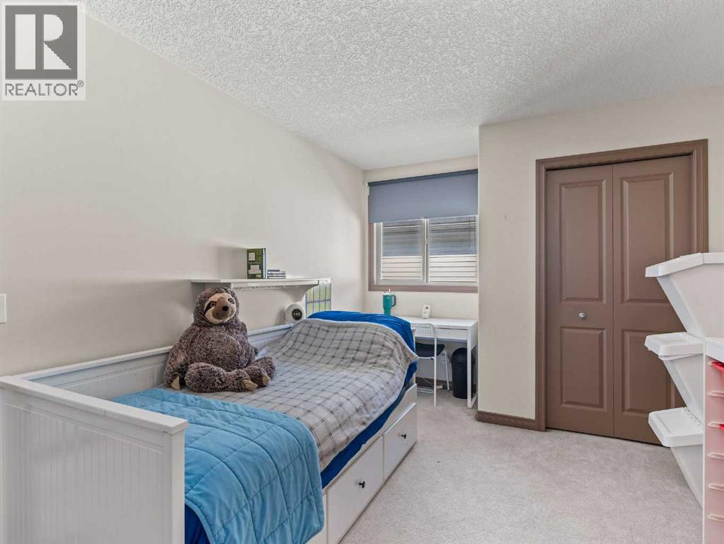 95 Crystal Shores Road, Okotoks, Alberta  T1S 2H9 - Photo 22 - A2277318