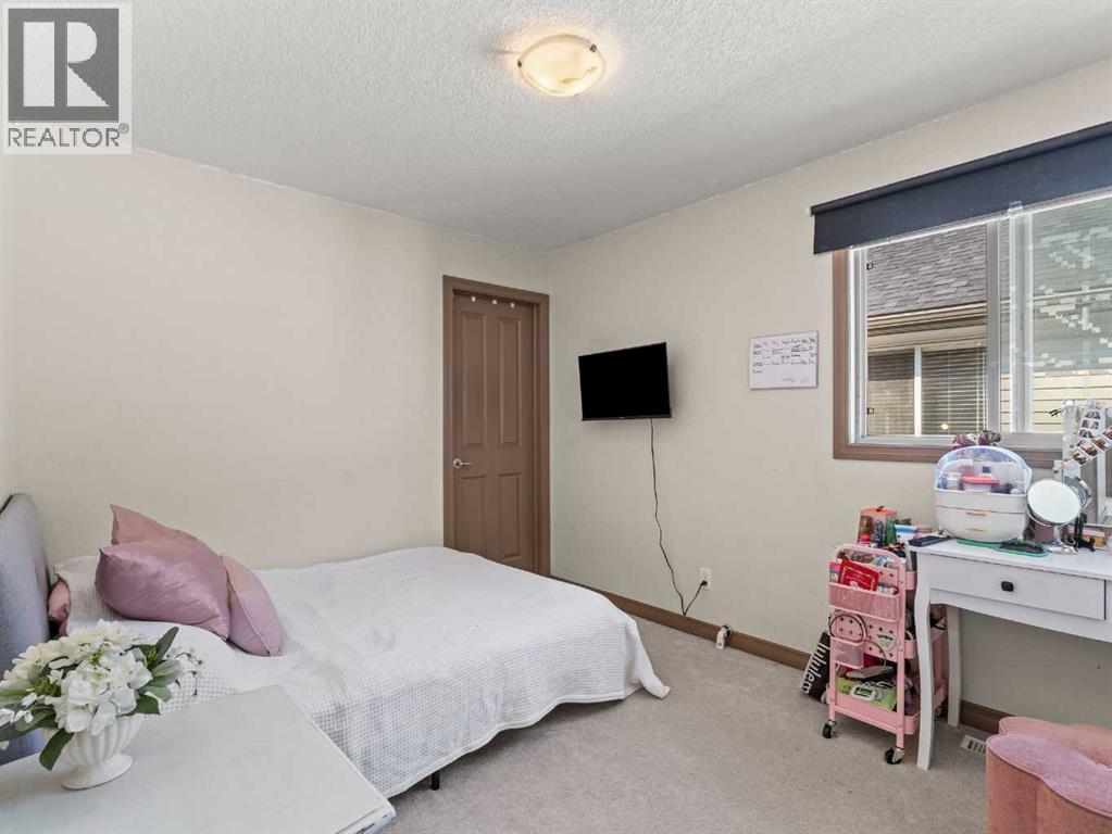 95 Crystal Shores Road, Okotoks, Alberta  T1S 2H9 - Photo 23 - A2277318