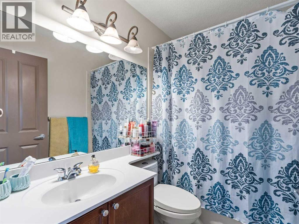 95 Crystal Shores Road, Okotoks, Alberta  T1S 2H9 - Photo 24 - A2277318