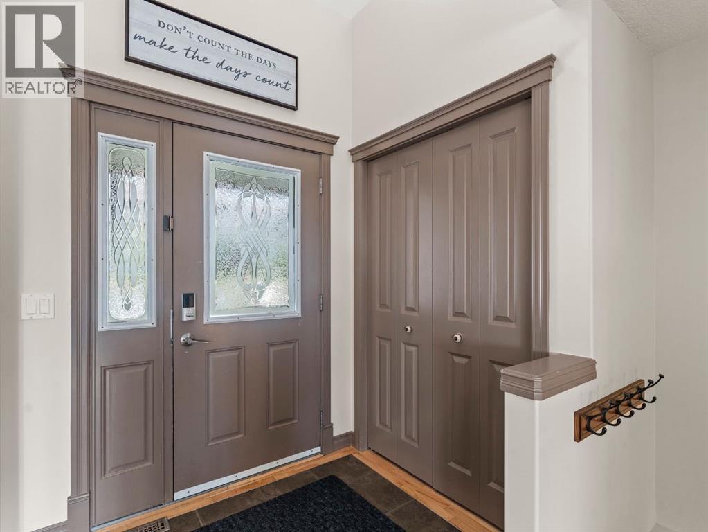 95 Crystal Shores Road, Okotoks, Alberta  T1S 2H9 - Photo 3 - A2277318