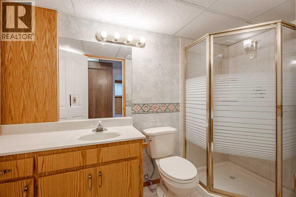 301 Riverview Green, Cochrane, Alberta  T4C 1K5 - Photo 38 - A2267736