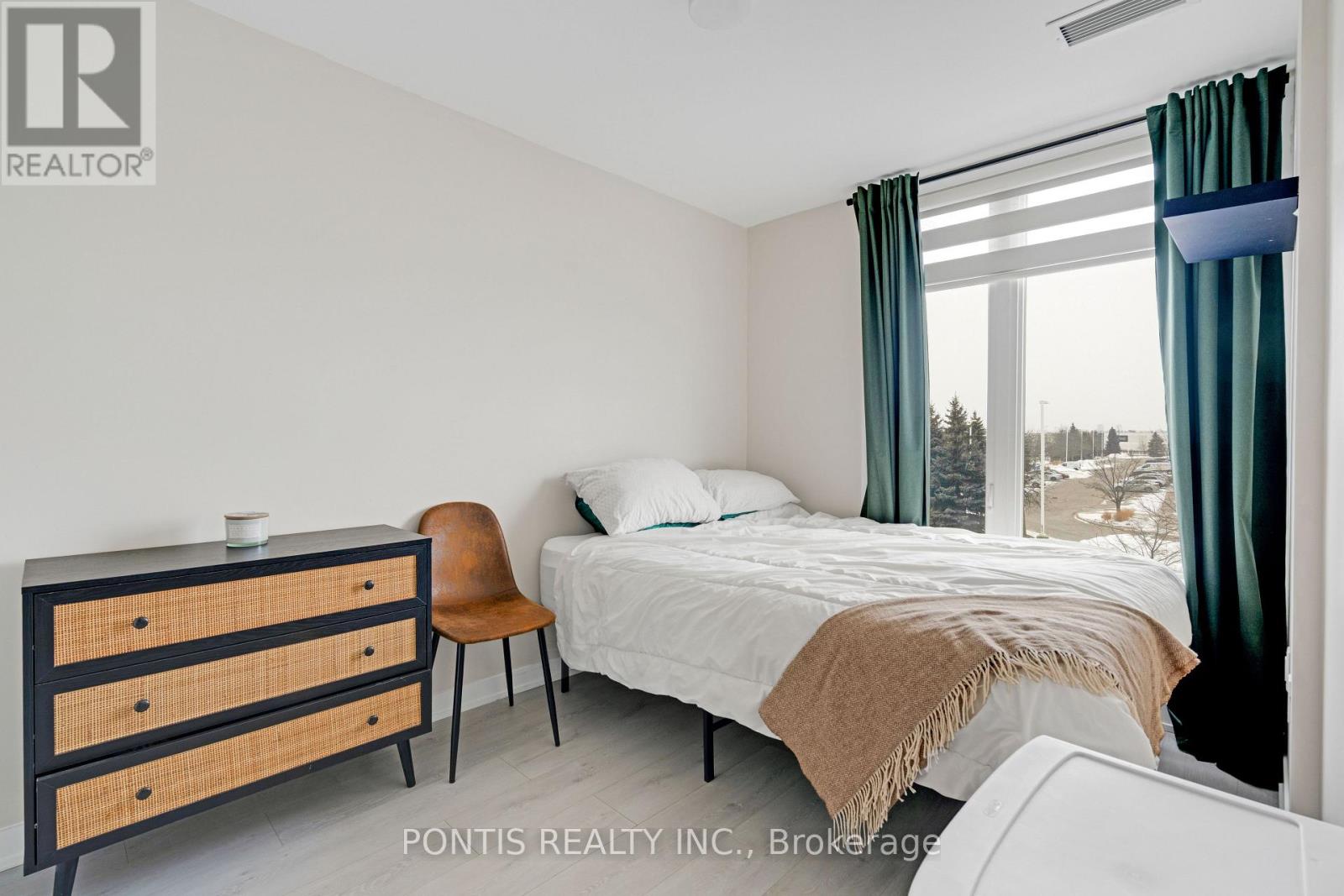 320 - 3401 Ridgeway Drive, Mississauga (Erin Mills), Ontario  L5L 5T3 - Photo 7 - W12673666