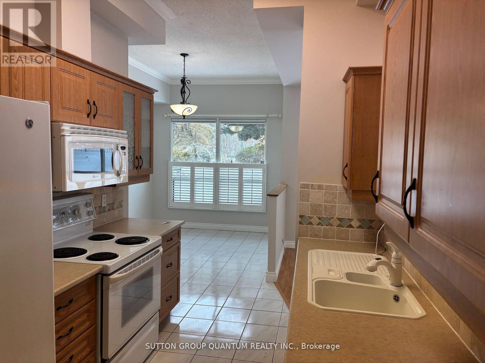 102 - 100 Millside Drive, Milton, Ontario  L9T 5E3 - Photo 16 - W12673742