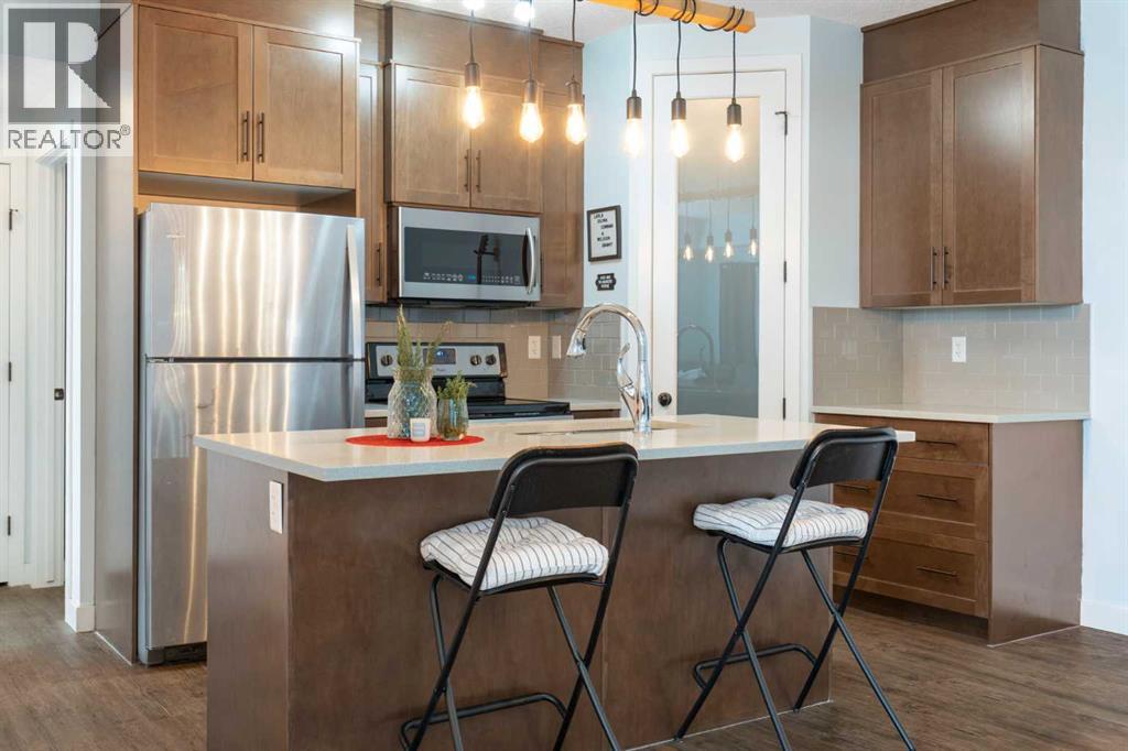 1104, 2461 Baysprings Link Sw, Airdrie, Alberta  T4B 0R7 - Photo 1 - A2276968