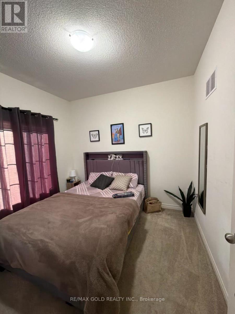 25 Truffle Court, Brampton, Ontario  L7A 5A6 - Photo 6 - W12674190