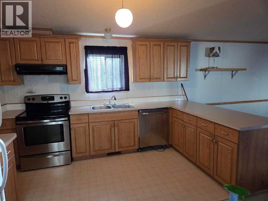 49, 900 Ross Street, Crossfield, Alberta  T0M 0S0 - Photo 2 - A2269240