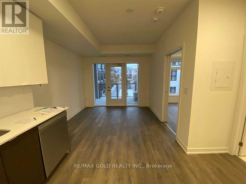 211 - 120 Canon Jackson Drive E, Toronto, Ontario  M6M 0B8 - Photo 2 - W12674502