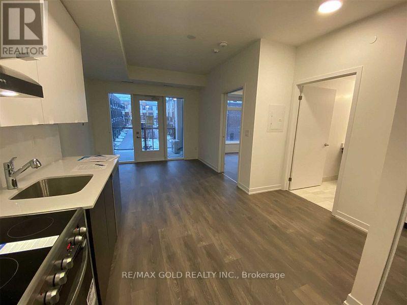 211 - 120 Canon Jackson Drive E, Toronto, Ontario  M6M 0B8 - Photo 4 - W12674502