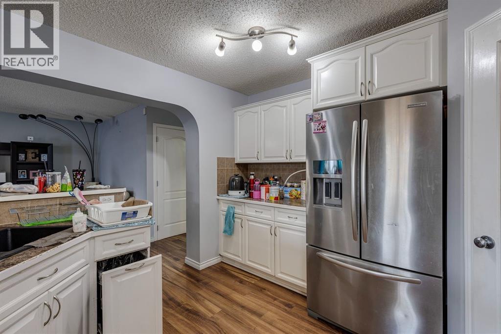 47 Westmount Road, Okotoks, Alberta  T1S 2J3 - Photo 10 - A2266980