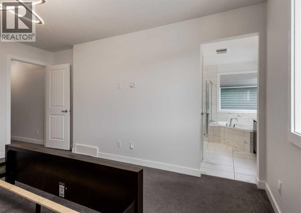100 Cougar Ridge Close Sw, Calgary, Alberta  T3H 0V4 - Photo 28 - A2275670