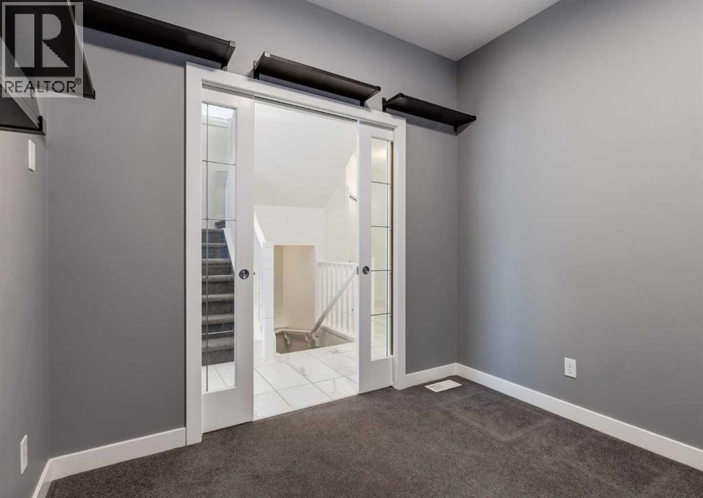 100 Cougar Ridge Close Sw, Calgary, Alberta  T3H 0V4 - Photo 19 - A2275670