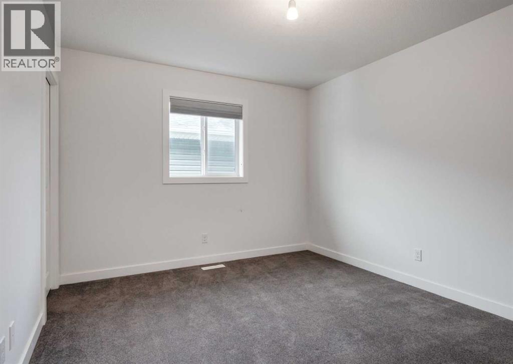 100 Cougar Ridge Close Sw, Calgary, Alberta  T3H 0V4 - Photo 36 - A2275670