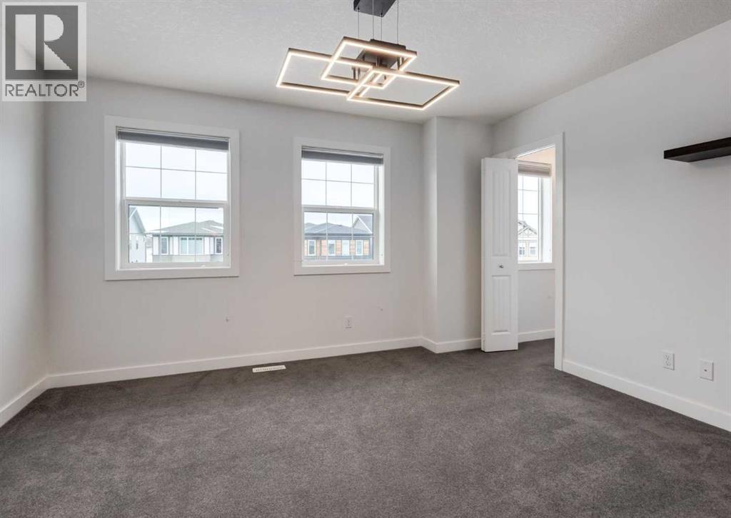 100 Cougar Ridge Close Sw, Calgary, Alberta  T3H 0V4 - Photo 32 - A2275670