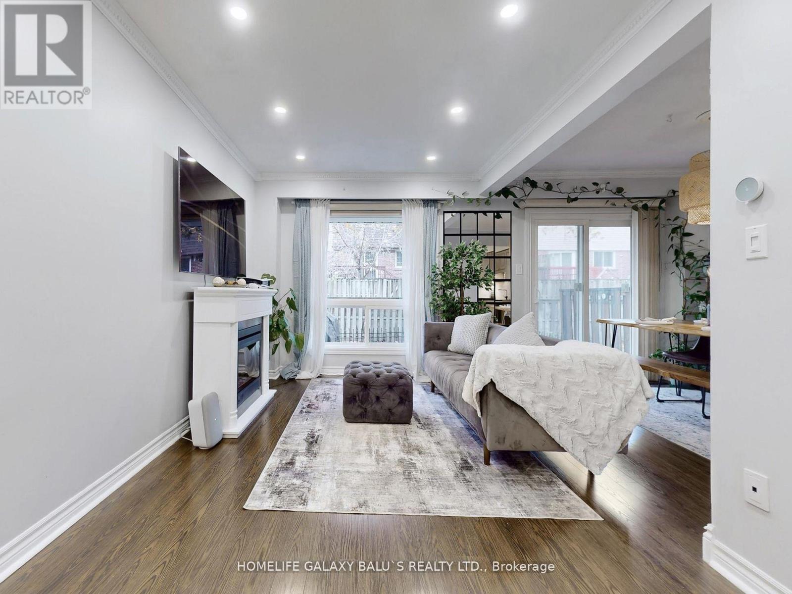 65 - 830 Stainton Drive, Mississauga, Ontario  L5C 2Z3 - Photo 2 - W12675172