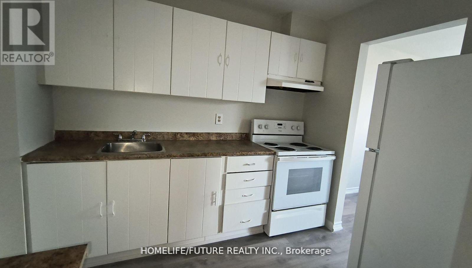 404 - 560 Bloor Street E, Oshawa, Ontario  L1H 3N2 - Photo 3 - E12675812