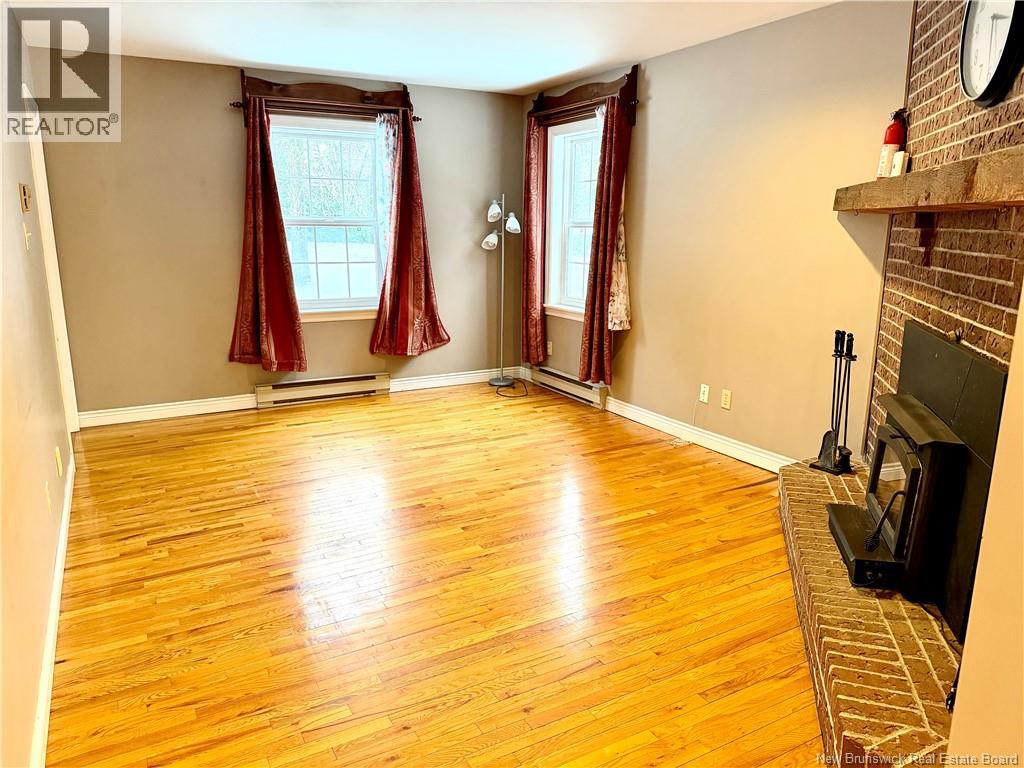 9 Ambassador Drive, Quispamsis, New Brunswick  E2E 2W4 - Photo 2 - NB131852