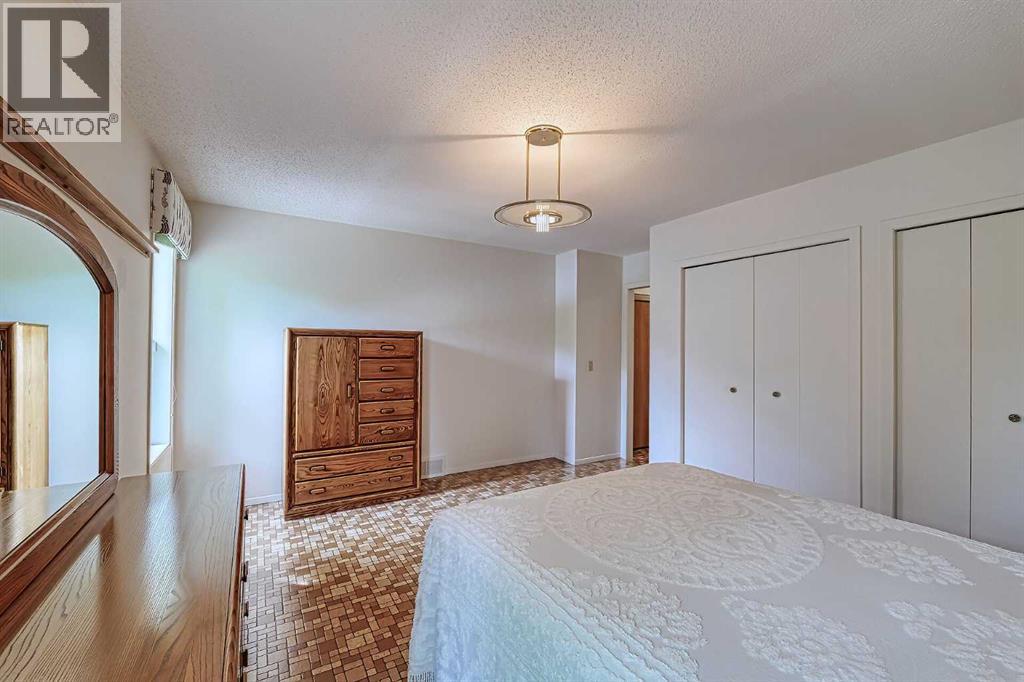 21 Welch Crescent, Okotoks, Alberta  T1S 1H2 - Photo 15 - A2267390