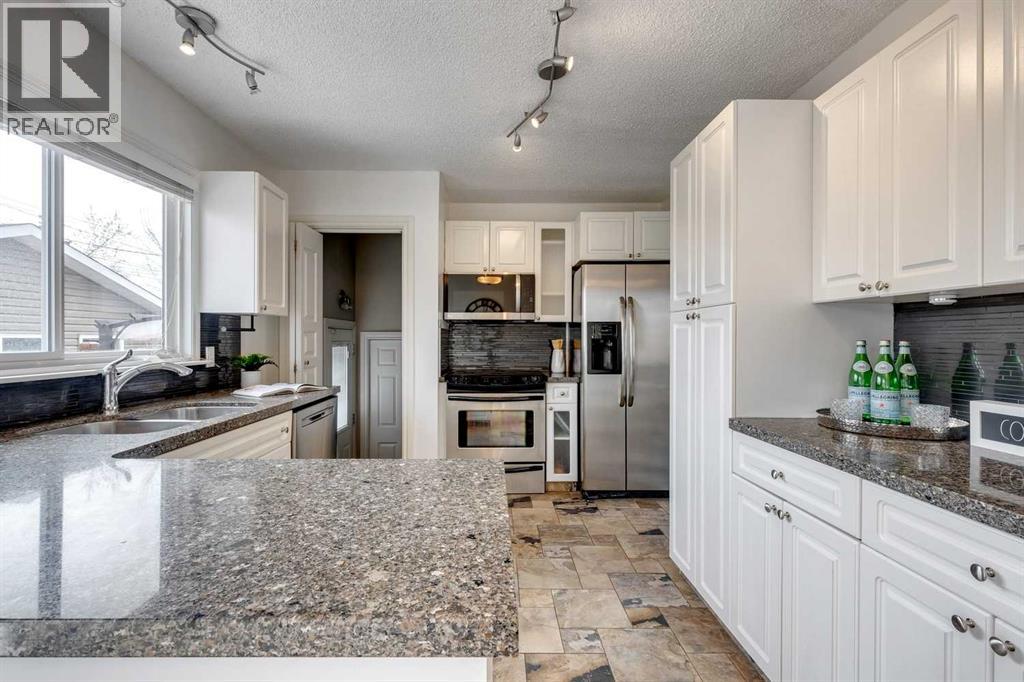 107 Sackville Drive Sw, Calgary, Alberta  T2W 0W4 - Photo 13 - A2277169