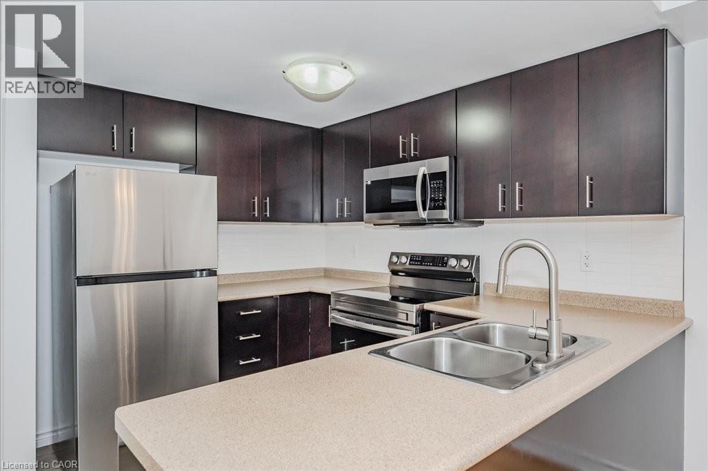 41 Goodwin Drive Unit# 202, Guelph, Ontario  N1L 0E7 - Photo 4 - 40797144