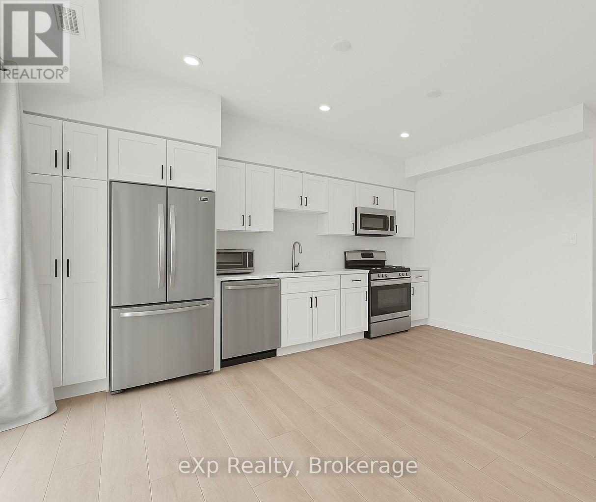 118 - 824 Woolwich Street, Guelph (Riverside Park), Ontario  N1H 6J2 - Photo 2 - X12677430