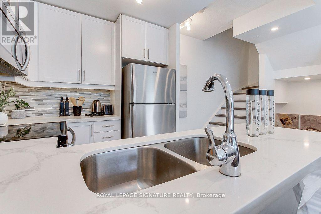 Th-104 - 90 Absolute Avenue, Mississauga, Ontario  L4Z 0A1 - Photo 21 - W12677462