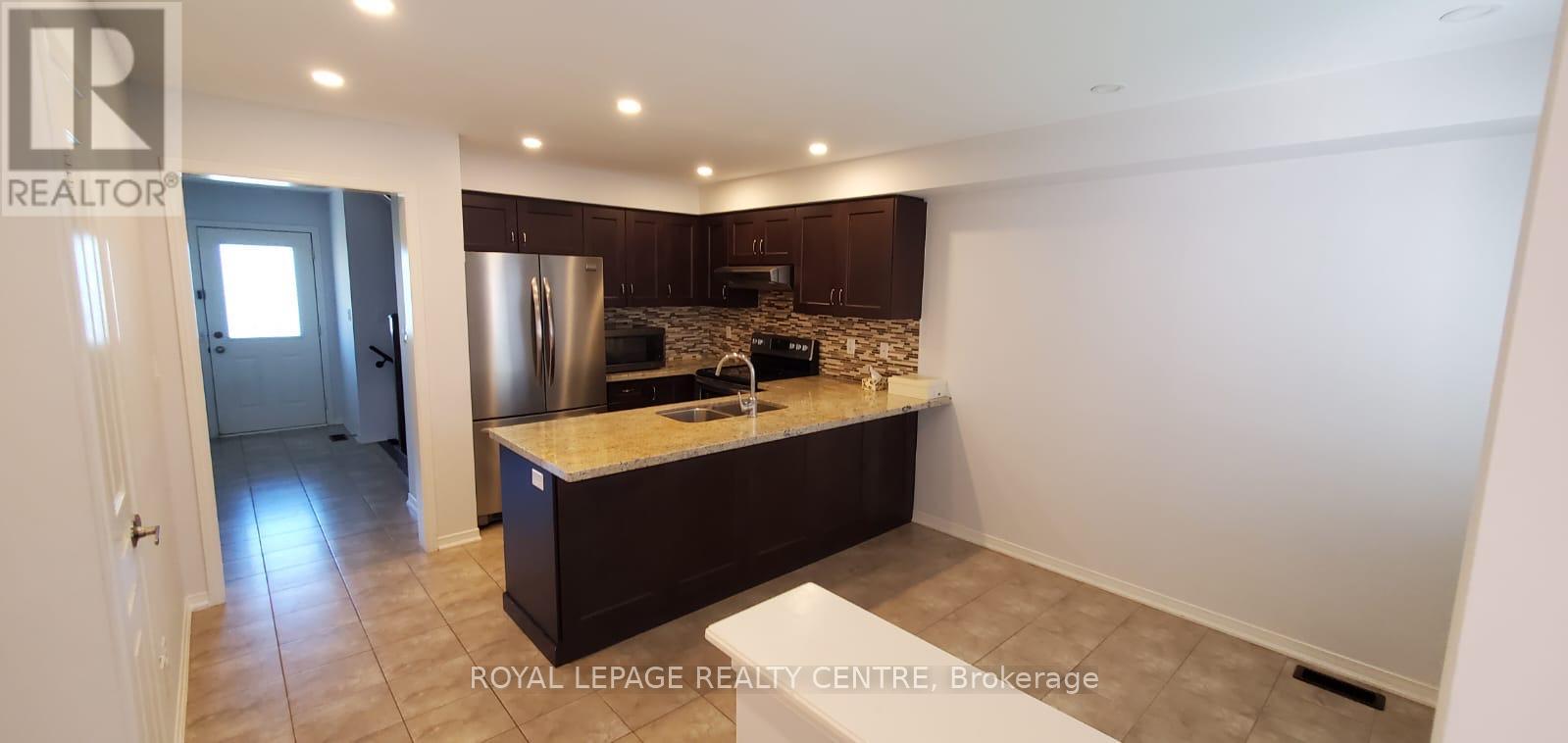 9 - 3045 Gladeside Avenue, Oakville, Ontario  L6M 0R3 - Photo 3 - W12674208