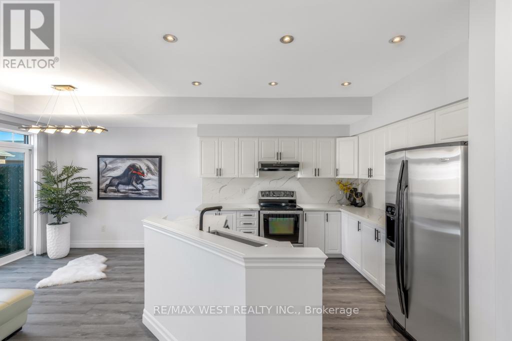 26 Ramage Lane, Toronto, Ontario  M9C 5S6 - Photo 5 - W12673358