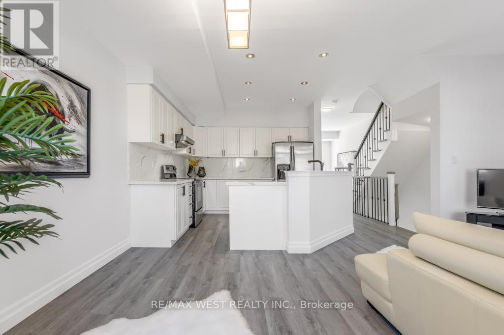 26 Ramage Lane, Toronto, Ontario  M9C 5S6 - Photo 4 - W12673358