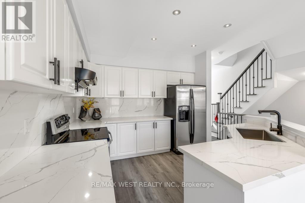 26 Ramage Lane, Toronto, Ontario  M9C 5S6 - Photo 6 - W12673358