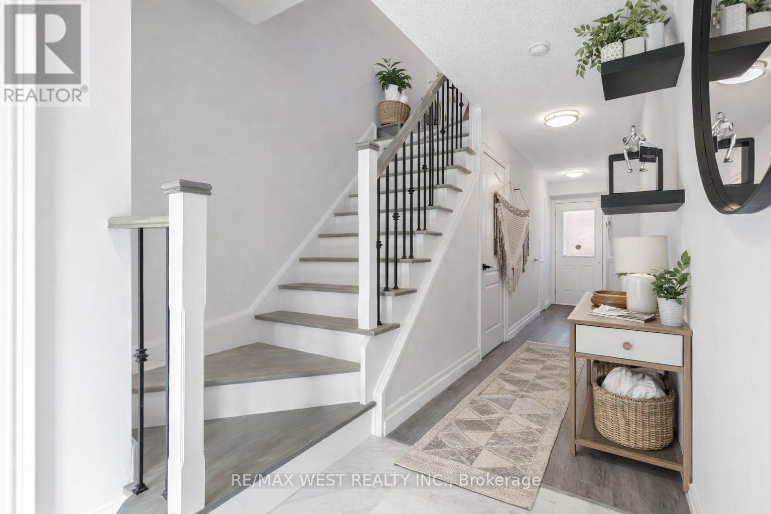 26 Ramage Lane, Toronto, Ontario  M9C 5S6 - Photo 2 - W12673358