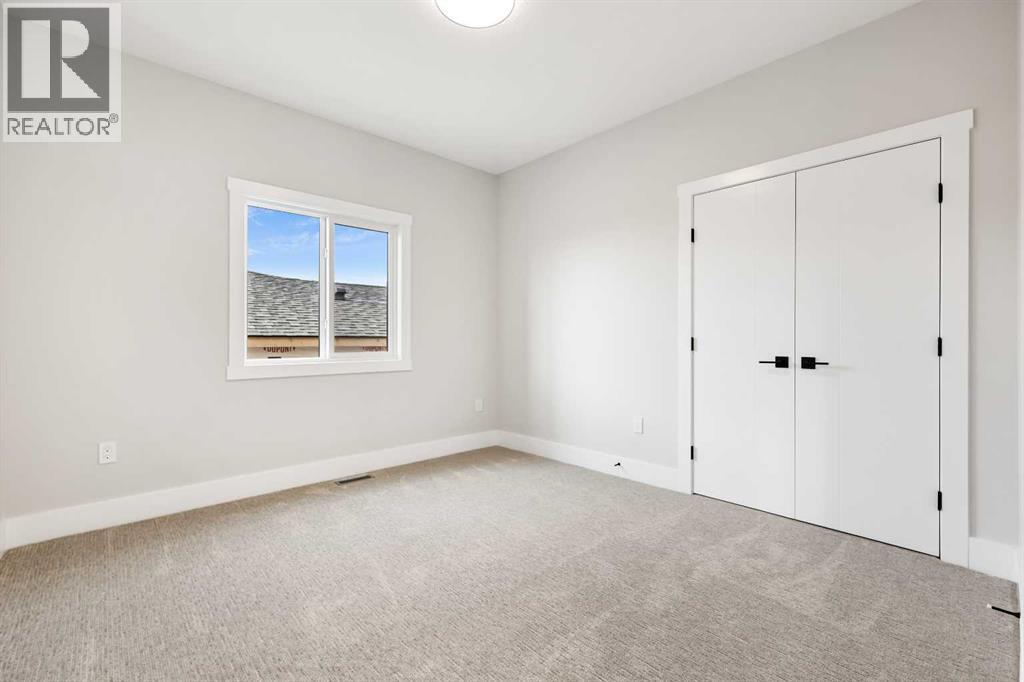 72 Heritage Ridge, Cochrane, Alberta  T4C 2J8 - Photo 31 - A2256304