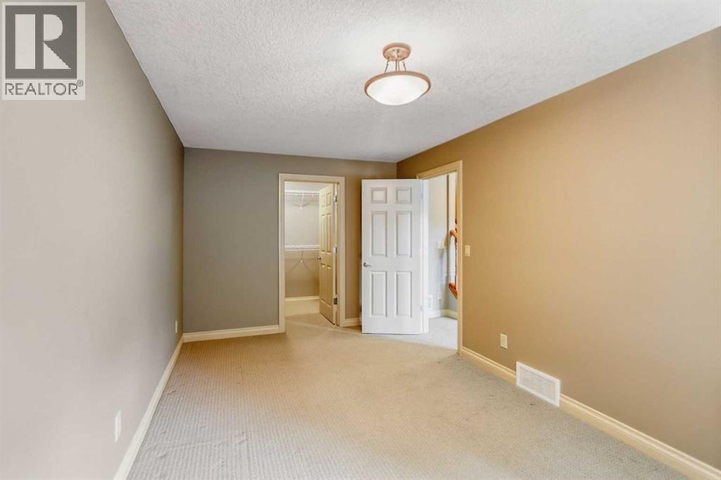 55 Billy Haynes Trail, Okotoks, Alberta  T1S 0P5 - Photo 32 - A2276830