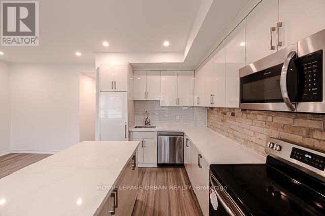 3 - 991 Queen Street E, Toronto, Ontario  M4M 1K2 - Photo 1 - E12678050