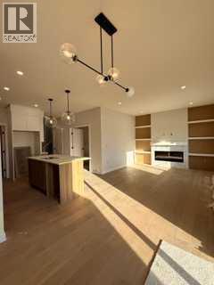 516 Heritage Boulevard, Cochrane, Alberta  T4C 2J8 - Photo 11 - A2277144