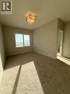 516 Heritage Boulevard, Cochrane, Alberta  T4C 2J8 - Photo 17 - A2277144