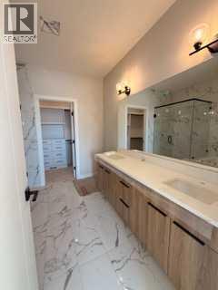 516 Heritage Boulevard, Cochrane, Alberta  T4C 2J8 - Photo 21 - A2277144